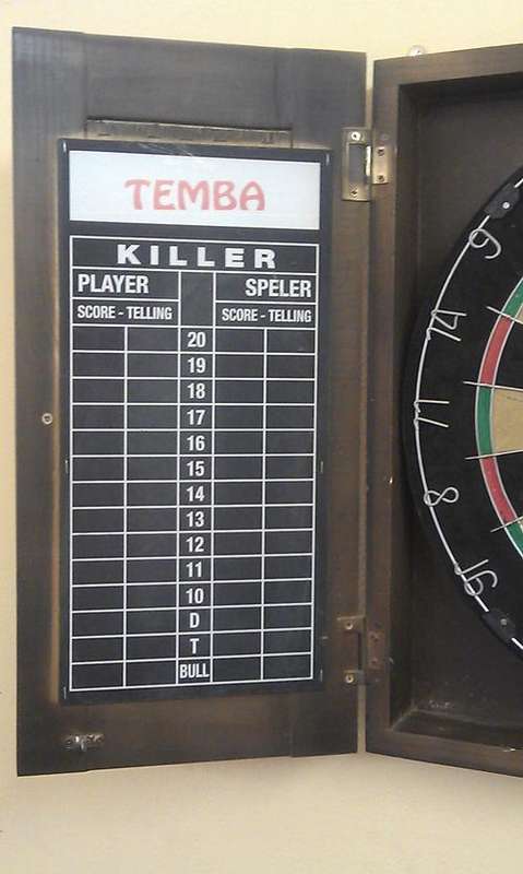 unicorn dart board with cabinet and darts