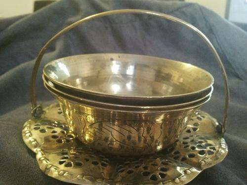 brass carrier and 3 brass bowls