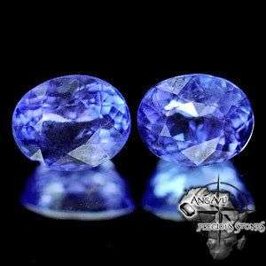 TWO 1.07 TCW NATURAL OVAL VIOLETISH BLUE TANZANITES