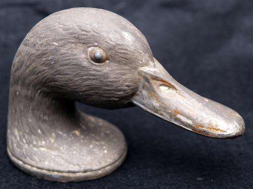 Ducky the Bottle Opening Duck from the '30s!