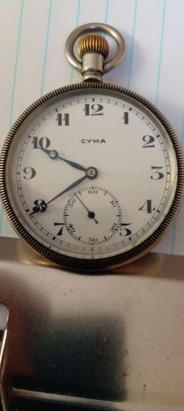 VINTAGE CYMA POCKET WATCH IN GOOD WORKING CONDITION. ORIGINAL AND A GOOD LOOKER.