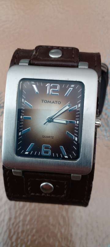 TOMATO WATCH FITTED WITH FOSSIL LEATHER STRAP. FULLY WORKING AND IN GREAT CONDITION.