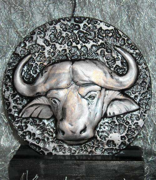 BUFFALO CANDLE ON STAND