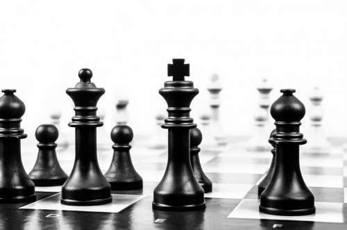 CHESS BOARD AND PAWNS