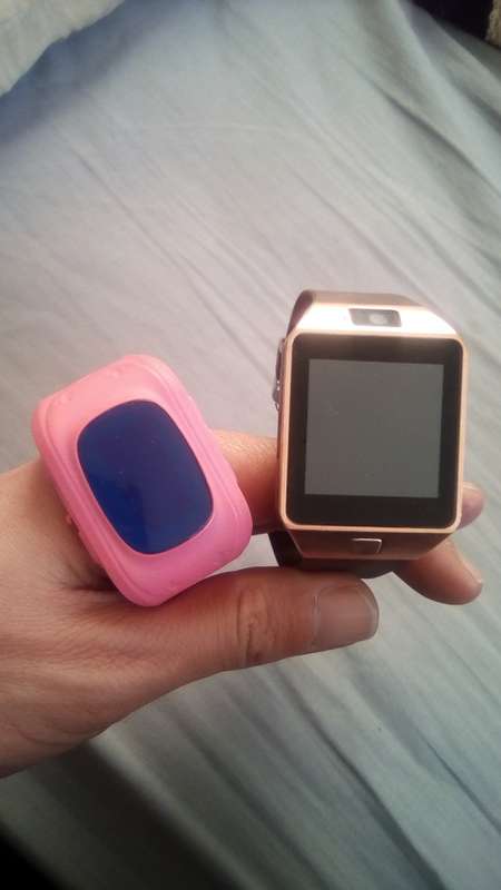 DZ09 Smart GSM Mobile Phone AND Smart Children Kid Safe GPS Tracker Watch