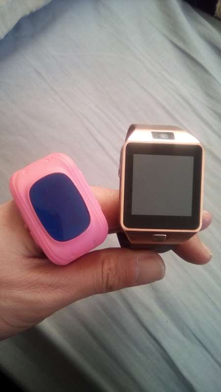 DZ09 Smart GSM Mobile Phone AND Smart Children Kid Safe GPS Tracker Watch