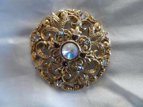 large goldtone vintage stamped brooch