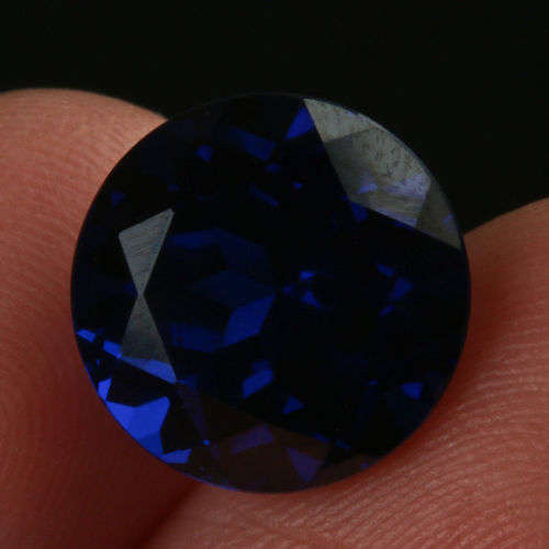 6.670 CT, STUNNING VVS, NATURAL TANZANITE, ROUND CUT, VIOLET BLUE