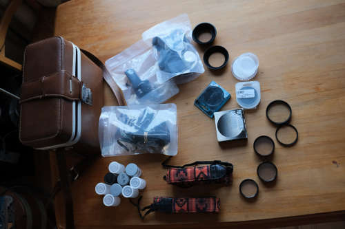 Filters, Adapters, Bag, Camera Straps, Cables and assorted camera accessories