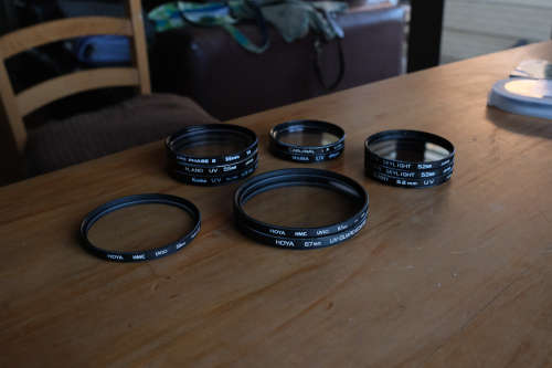 Filters, Adapters, Bag, Camera Straps, Cables and assorted camera accessories