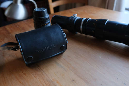 Two lenses and two lens adapters - Sakar 135mm f3.5, Cunor 400mm f6.3 lens, Yashica adapters