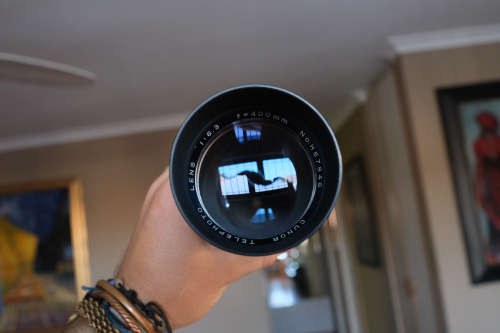 Two lenses and two lens adapters - Sakar 135mm f3.5, Cunor 400mm f6.3 lens, Yashica adapters