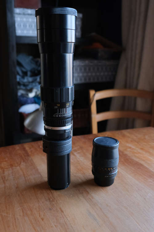Two lenses and two lens adapters - Sakar 135mm f3.5, Cunor 400mm f6.3 lens, Yashica adapters