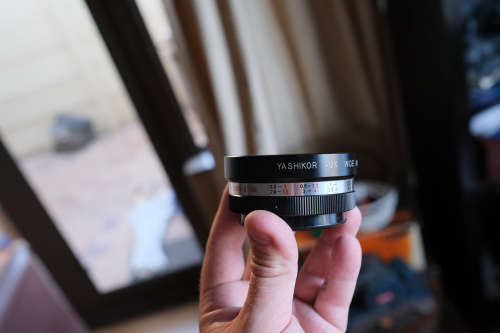 Two lenses and two lens adapters - Sakar 135mm f3.5, Cunor 400mm f6.3 lens, Yashica adapters