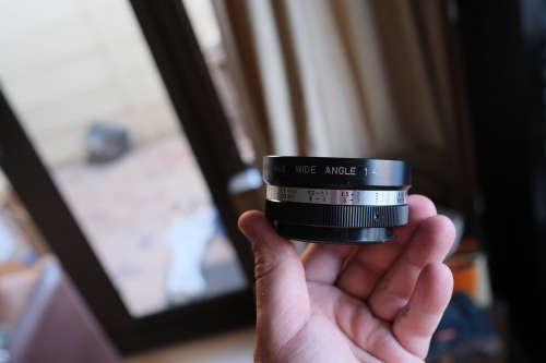 Two lenses and two lens adapters - Sakar 135mm f3.5, Cunor 400mm f6.3 lens, Yashica adapters