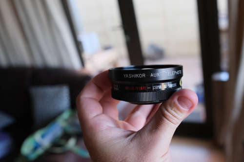 Two lenses and two lens adapters - Sakar 135mm f3.5, Cunor 400mm f6.3 lens, Yashica adapters
