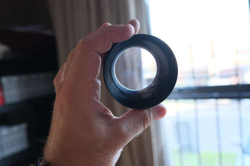 Two lenses and two lens adapters - Sakar 135mm f3.5, Cunor 400mm f6.3 lens, Yashica adapters