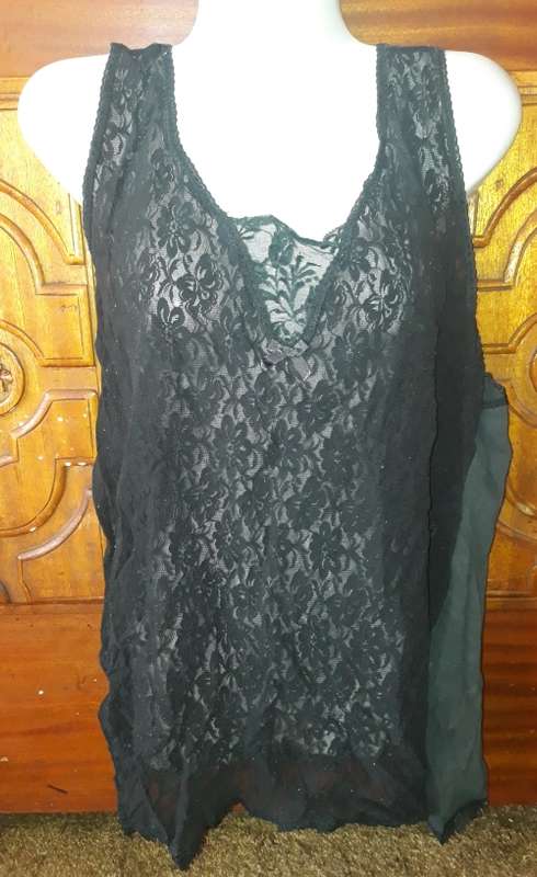 LADIES BLACK TOP - ITS GOT SOME FLUFF ON IT