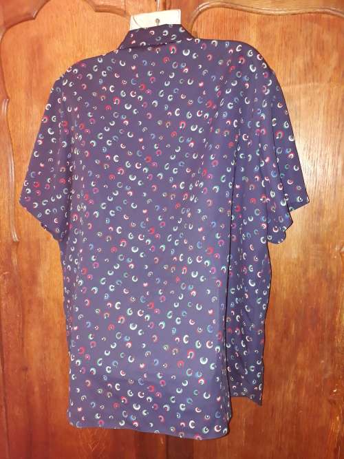 LADIES: BLUE MULTI COLORED BLOUSE - MAKE: JADE CORPORATE - SIZE: 22