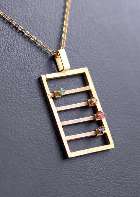 9CT YELLOW GOLD ABACUS PENDANT WITH DIAMOND, TOURMALINE, QUARTZ AND SPINEL GEMSTONES. QUIRKY!