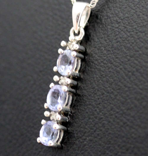 VINTAGE TANZANITE AND DIAMOND DELICATE PENDANT NECKLACE IN 10K WHITE GOLD. GEOMETRIC CUBE DESIGN.