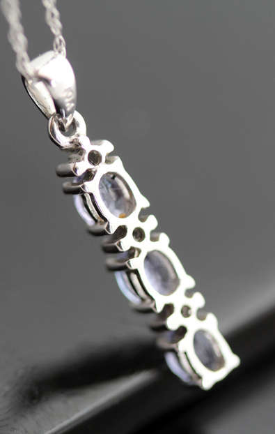 VINTAGE TANZANITE AND DIAMOND DELICATE PENDANT NECKLACE IN 10K WHITE GOLD. GEOMETRIC CUBE DESIGN.