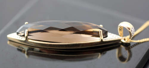 UNUSUAL MARQUISE SHAPED SMOKY QUARTZ AND DIAMOND 9CT ITALIAN GOLD PENDANT ON 43CM CHAIN. CLASSY.