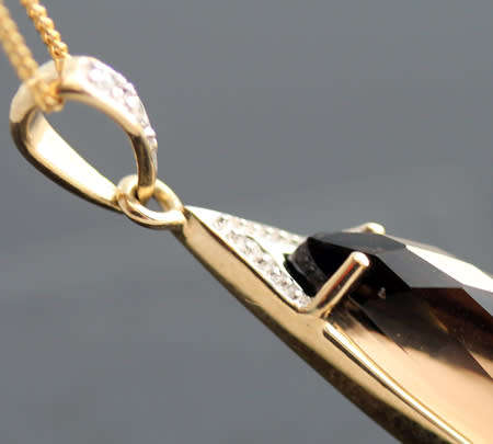 UNUSUAL MARQUISE SHAPED SMOKY QUARTZ AND DIAMOND 9CT ITALIAN GOLD PENDANT ON 43CM CHAIN. CLASSY.
