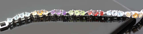 COLOURFUL AMETHYST, GARNET, TOPAZ AND PERIDOT STERLING SILVER TENNIS BRACELET. SOLID 925