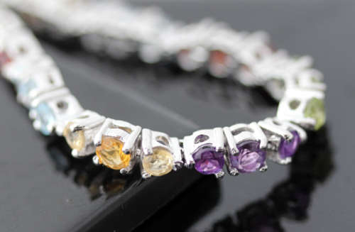 COLOURFUL AMETHYST, GARNET, TOPAZ AND PERIDOT STERLING SILVER TENNIS BRACELET. SOLID 925