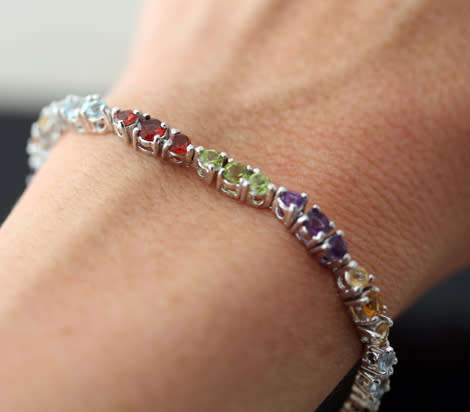 COLOURFUL AMETHYST, GARNET, TOPAZ AND PERIDOT STERLING SILVER TENNIS BRACELET. SOLID 925