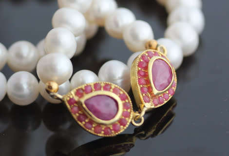 VERY LONG 83cm PEARL NECKLACE WITH ELEGANT FEATURE NATURAL RUBIES IN GOLD-HUED STERLING SILVER