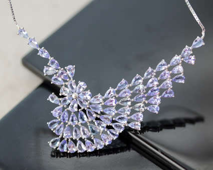 DRAMATIC AND ELEGANT REAL TANZANITE STERLING SILVER WAVE-LIKE RIGID FEATURE NECKLACE