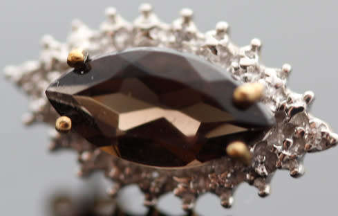 VINTAGE MARQUISE CUT SMOKY QUARTZ 9CT GOLD STUD EARRINGS WITH DIAMOND ACCENTS. 375