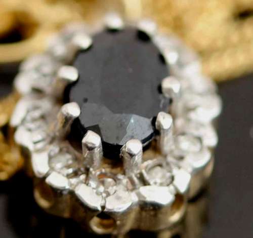ENGLISH VINTAGE SAPPHIRE 0,38ct SOLITAIRE & DIAMOND PENDANT ON 9CT GOLD CHAIN. BIRMINGHAM ASSAY 1989