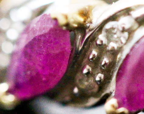 VINTAGE 9CT HALF ETERNITY YELLOW AND WHITE GOLD RUBY AND DIAMOND RING. 375
