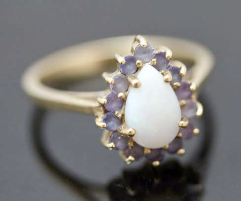 VINTAGE 9CT YELLOW GOLD PEAR FACETED NATURAL OPAL AND TANZANITE RING
