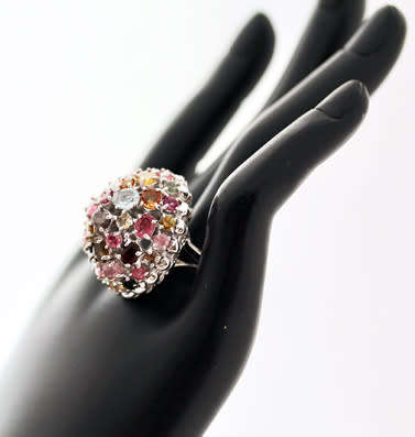 STRIKING LARGE, DOMED HEAVY, MULTICOLOURED TOURMALINE STERLING SILVER RING. 295