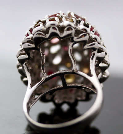 STRIKING LARGE, DOMED HEAVY, MULTICOLOURED TOURMALINE STERLING SILVER RING. 295