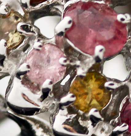 STRIKING LARGE, DOMED HEAVY, MULTICOLOURED TOURMALINE STERLING SILVER RING. 295