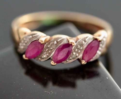 VINTAGE 9CT HALF ETERNITY YELLOW AND WHITE GOLD RUBY AND DIAMOND RING. 375