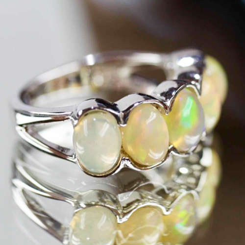 CONTEMPORARY FULL FLASH UN HEATED NATURAL FIRE OPAL STERLING SILVER RING. 925