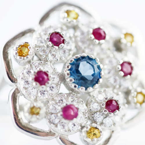 LONDON BLUE TOPAZ, NATURAL SONGEA SAPPHIRES and RUBY STERLING SILVER RING `TUDOR ROSE` DESIGN