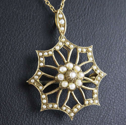 ANTIQUE 9CT YELLOW GOLD PENDANT/BROOCH SET WITH 65 SEED PEARLS. *JEWELLER EVALUATION R8`500*