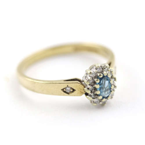PRETTY ENGLISH TOPAZ AND DIAMOND 9CT YELLOW GOLD RING. 375. *JEWELLER`S EVALUATION R14`000*