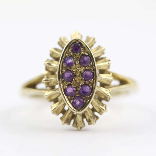 UNUSUAL AMETHYST 9CT YELLOW GOLD RING WITH DECORATIVE OPENWORK FRAME. 375. ASSAY MARK.
