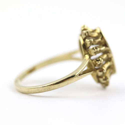 UNUSUAL AMETHYST 9CT YELLOW GOLD RING WITH DECORATIVE OPENWORK FRAME. 375. ASSAY MARK.