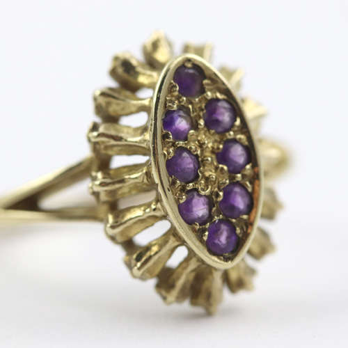 UNUSUAL AMETHYST 9CT YELLOW GOLD RING WITH DECORATIVE OPENWORK FRAME. 375. ASSAY MARK.