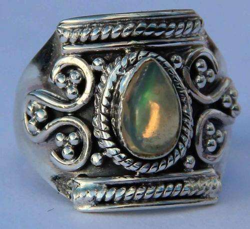 NATURAL ETHIOPIAN OPAL IN STERLING SILVER 925 SURROUNDED BY BEAUTIFUL INTRICATE DESIGN. Size 7/half