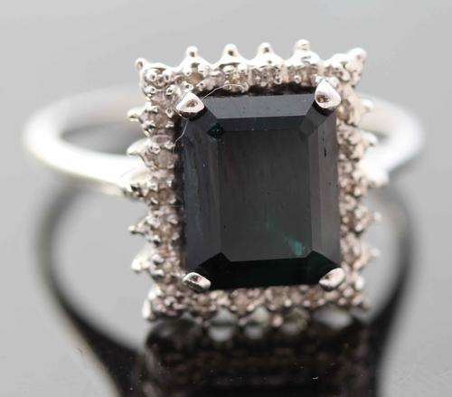 HUGE NATURAL SEA-GREEN SAPPHIRE AND DIAMOND RING IN 9ct WHITE GOLD. FROM BIRMINGHAM, ENGLAND.